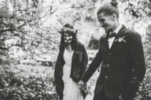 Bride and groom at alternative wedding celebration, outdoors Bride and groom at alternative wedding celebration, outdoors